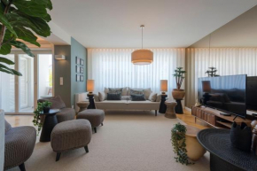 Emporium Deluxe 3BR Apartment w/ Private Parking by LovelyStay